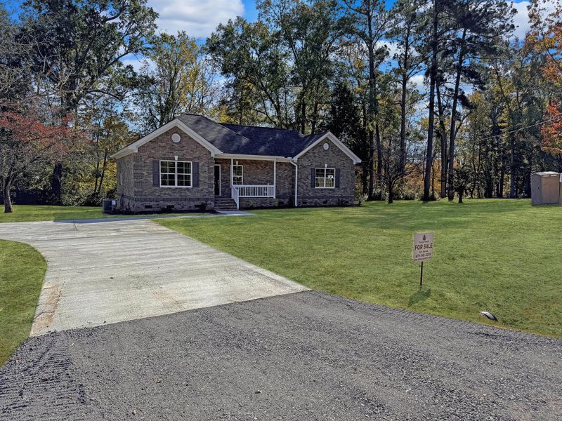 Front exterior of a new home in , Orangeburg, SC, highlighting curb appeal (Image 1). Front exterior of a new home in , Orangeburg, SC, highlighting curb appeal (Image 1).