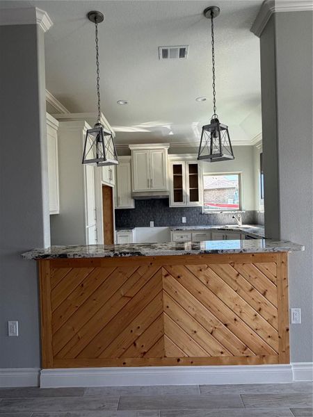 Bar view from living area with beautiful wood work