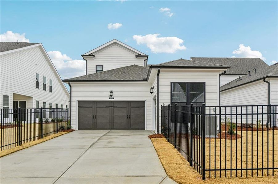 Front exterior of a new home in Promenade at Sawnee Village, Cumming, GA, highlighting curb appeal (Image 25).