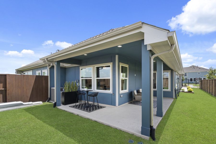 Exterior details and patio area of a home in Meridiana, Manvel (Image 4).