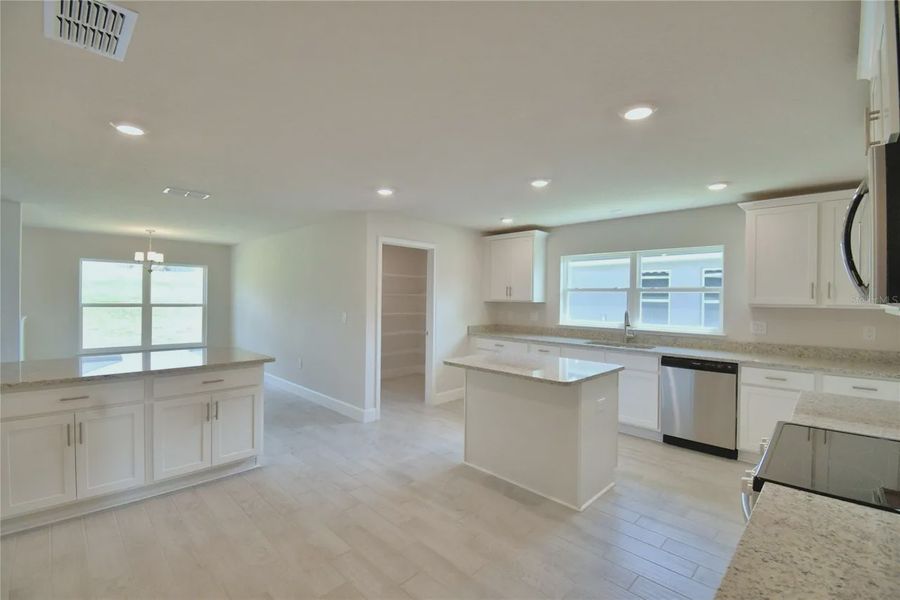 Furnished interior view inside a new home in Lake Juliana Estates, Auburndale (Image 7).