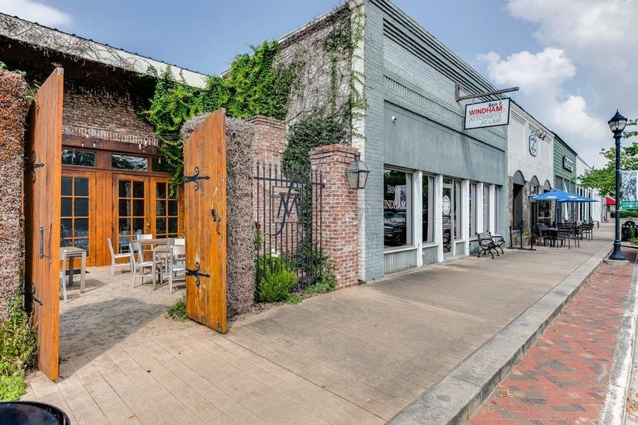 Front exterior of a new home in The Pointe at Heron Bay, Locust Grove, GA, highlighting curb appeal (Image 2). Front exterior of a new home in The Pointe at Heron Bay, Locust Grove, GA, highlighting curb appeal (Image 2).