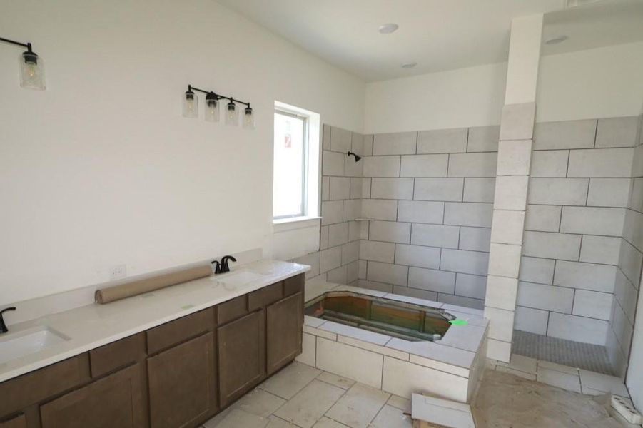 Furnished interior view inside a new home in Meridiana 55' Homesites, Manvel (Image 12).