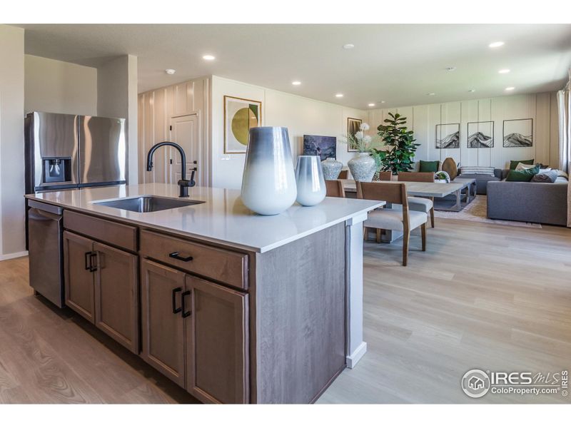 EXAMPLE PHOTO: KITCHEN OPEN TO DINING AND GREAT ROOM