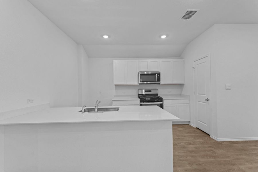 Furnished interior view inside a new home in Valverde, Bastrop (Image 5).