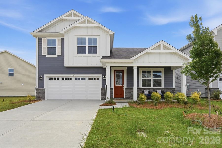 Front exterior of a new home in Waxhaw Landing, Monroe, NC, highlighting curb appeal (Image 1). Front exterior of a new home in Waxhaw Landing, Monroe, NC, highlighting curb appeal (Image 1).