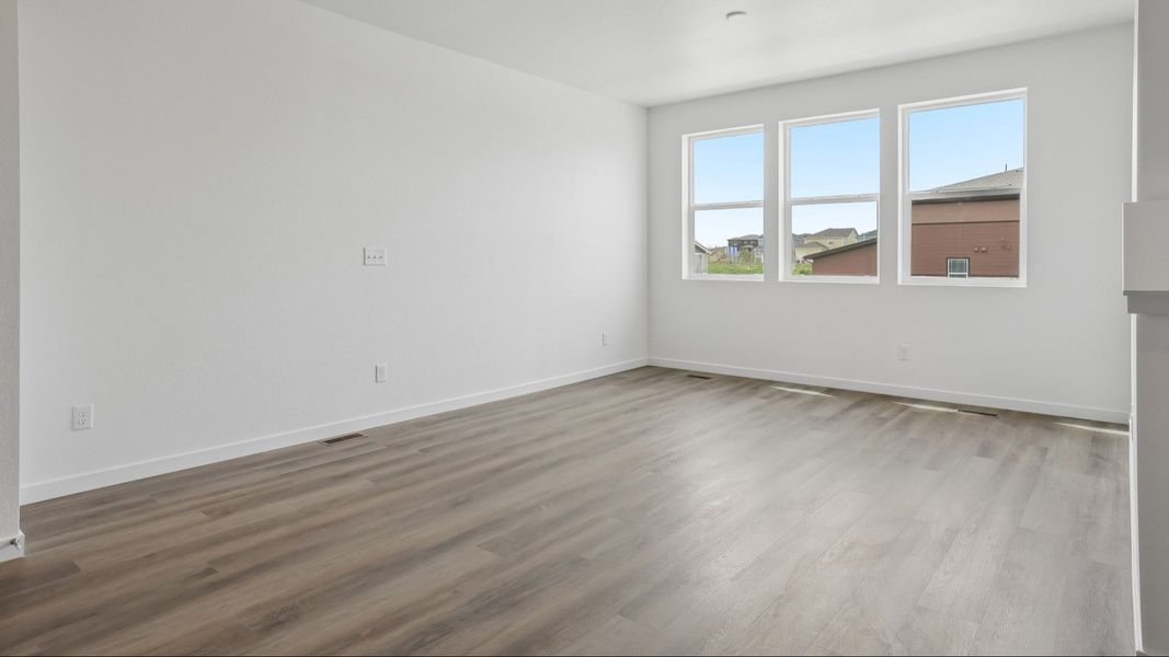 Living area with open layout and natural light. Living area with open layout and natural light.
