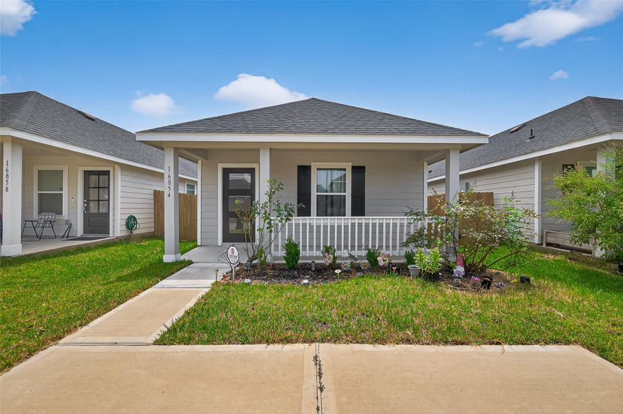 Front exterior of a new home in , Conroe, TX, highlighting curb appeal (Image 2). Front exterior of a new home in , Conroe, TX, highlighting curb appeal (Image 2).