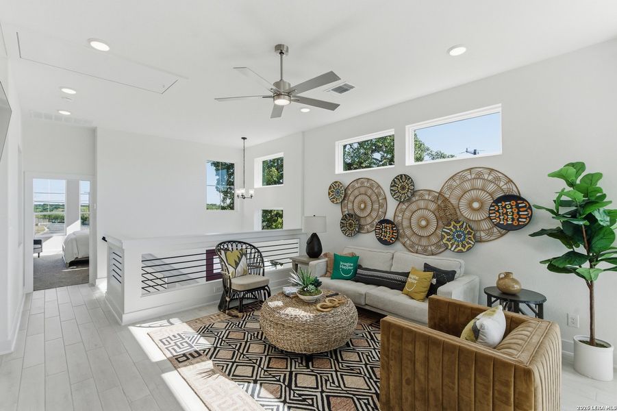 Furnished interior view inside a new home in Centero at Stone Oak, San Antonio (Image 14).