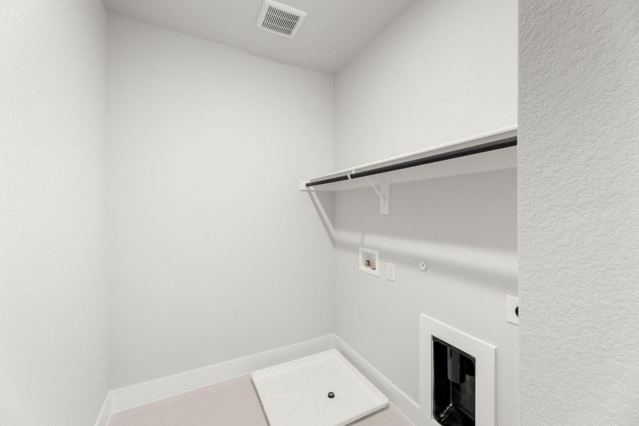 Spacious, unfurnished interior of a new home in Terrace Collection at Harvest, Argyle (Image 23).