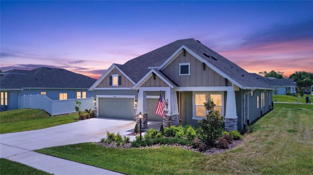 Front exterior of a new home in Carmela, San Antonio, FL, highlighting curb appeal (Image 26). Front exterior of a new home in Carmela, San Antonio, FL, highlighting curb appeal (Image 26).