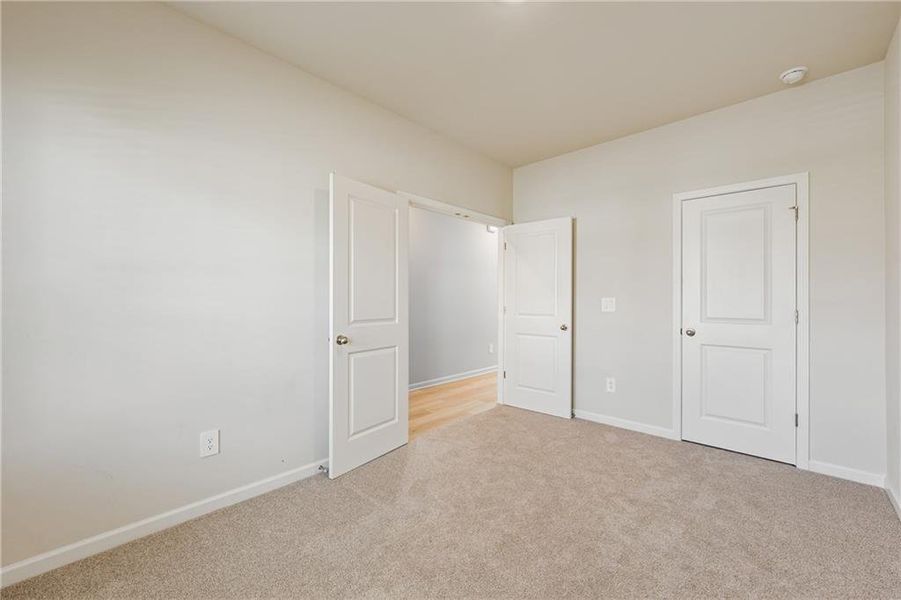 Spacious, unfurnished interior of a new home in Creekside at Oxford Park, Fairburn (Image 31).