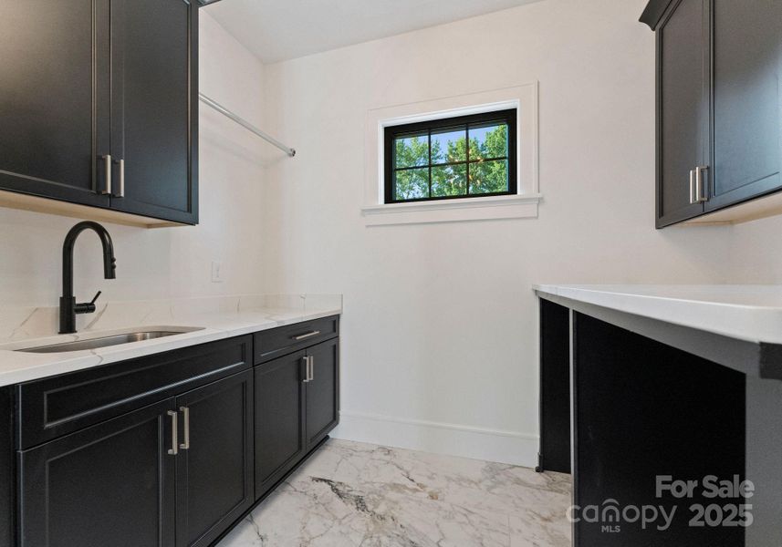Primary bathroom offers large soaker tub and oversized walk in shower with rain head shower and dolomite marble floors. Primary bathroom offers large soaker tub and oversized walk in shower with rain head shower and dolomite marble floors.