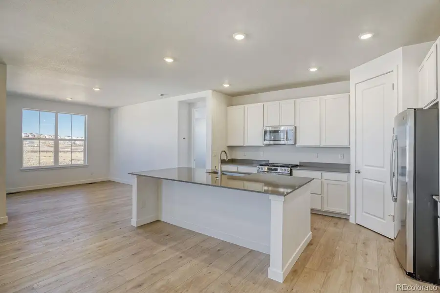 Furnished interior view inside a new home in Newlin Crossing, Parker (Image 8). Furnished interior view inside a new home in Newlin Crossing, Parker (Image 8).