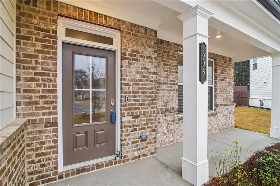 Exterior details and patio area of a home in Pinecrest Ridge, Dacula (Image 4). Exterior details and patio area of a home in Pinecrest Ridge, Dacula (Image 4).