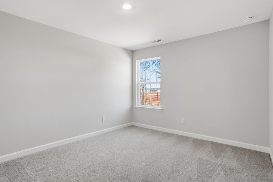 Spacious, unfurnished interior of a new home in Sweetbrier, Durham (Image 40).