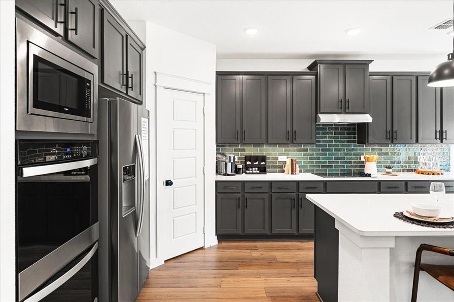 Furnished interior view inside a new home in Keeneland 50s, Aubrey (Image 4). Furnished interior view inside a new home in Keeneland 50s, Aubrey (Image 4).