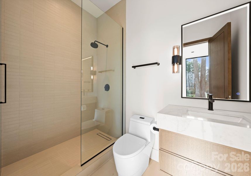 Main-level office full bathroom. Main-level office full bathroom.