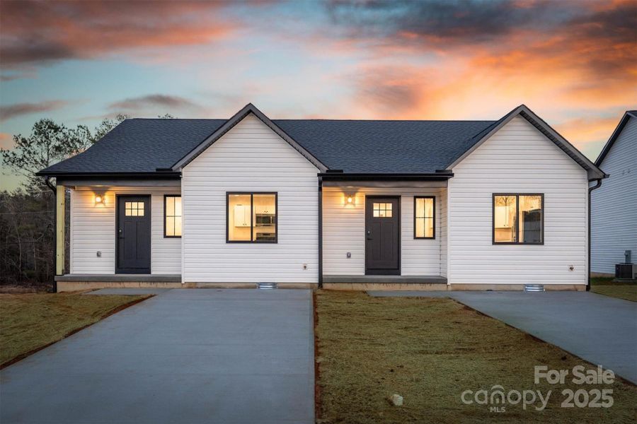 Front exterior of a new home in , Valdese, NC, highlighting curb appeal (Image 10). Front exterior of a new home in , Valdese, NC, highlighting curb appeal (Image 10).