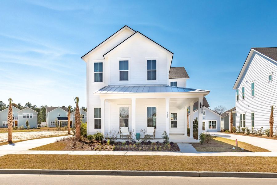 Front exterior of a new home in Heron's Walk at Summers Corner, Summerville, SC, highlighting curb appeal (Image 2).