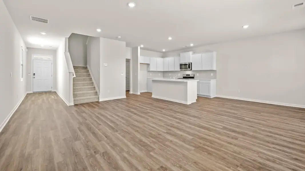 Representative unfurnished interior of a home built from the Saratoga by D.R. Horton in Branford Crossing, Stockbridge (Image 12).
