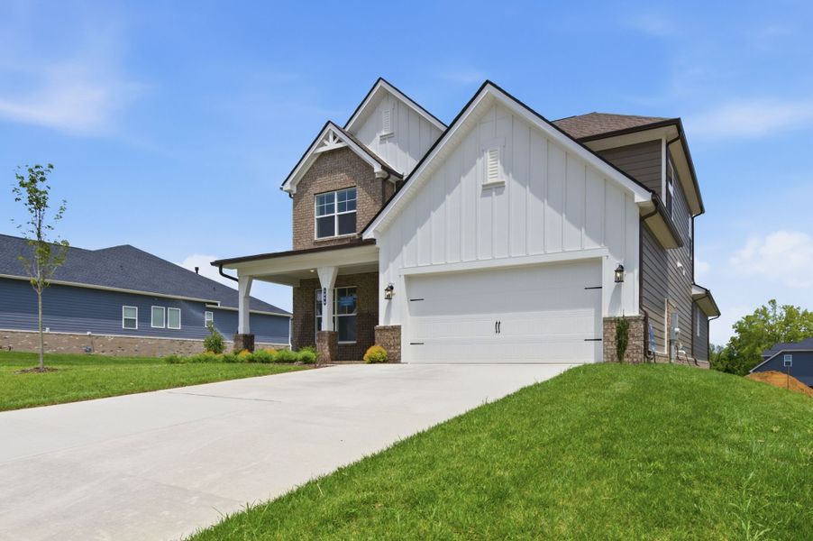 Front exterior of a new home in The Preserve at Five Oaks, Lebanon, TN, highlighting curb appeal (Image 18).