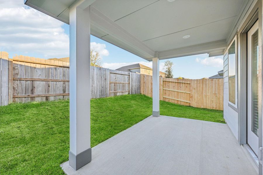 Exterior details and patio area of a home in Stewart's Ranch, Conroe (Image 3).