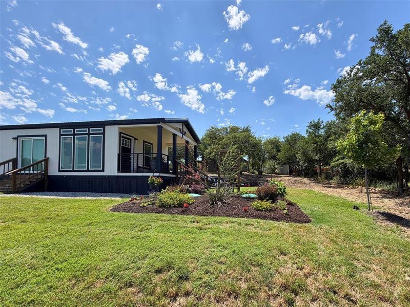 Exterior details and patio area of a home in , Runaway Bay (Image 20).