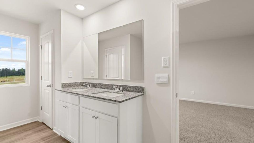 Furnished interior view inside a new home in Carlton, Douglasville (Image 6). Furnished interior view inside a new home in Carlton, Douglasville (Image 6).