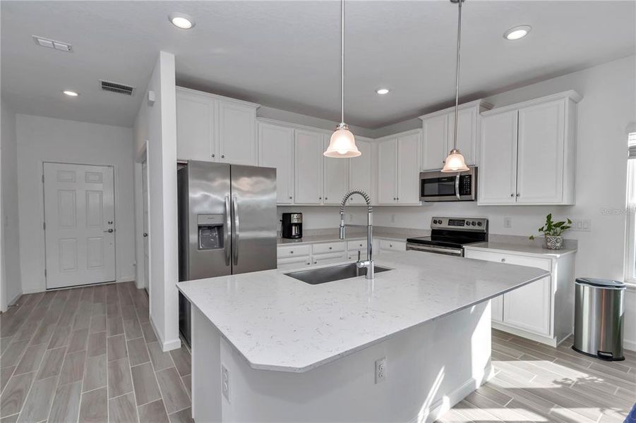 Furnished interior view inside a new home in Liberty Village: Liberty Village - Phase One, Ocala (Image 18). Furnished interior view inside a new home in Liberty Village: Liberty Village - Phase One, Ocala (Image 18).