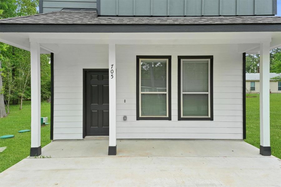 Front exterior of a new home in , Montgomery, TX, highlighting curb appeal (Image 7). Front exterior of a new home in , Montgomery, TX, highlighting curb appeal (Image 7).