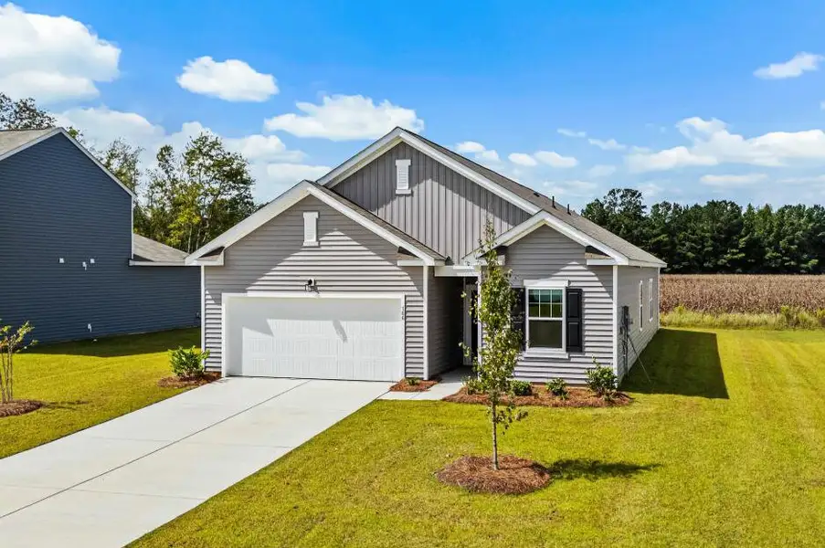 Front exterior of a new home in Watson Hill, Summerville, SC, highlighting curb appeal (Image 1). Front exterior of a new home in Watson Hill, Summerville, SC, highlighting curb appeal (Image 1).