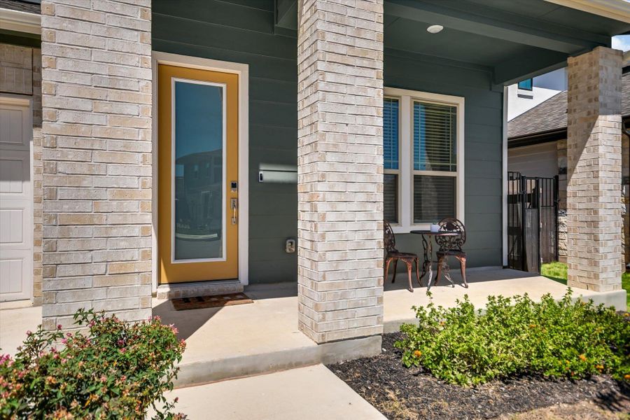 Brick pillars and a covered entryway create a welcoming arrival to this modern home. Brick pillars and a covered entryway create a welcoming arrival to this modern home.