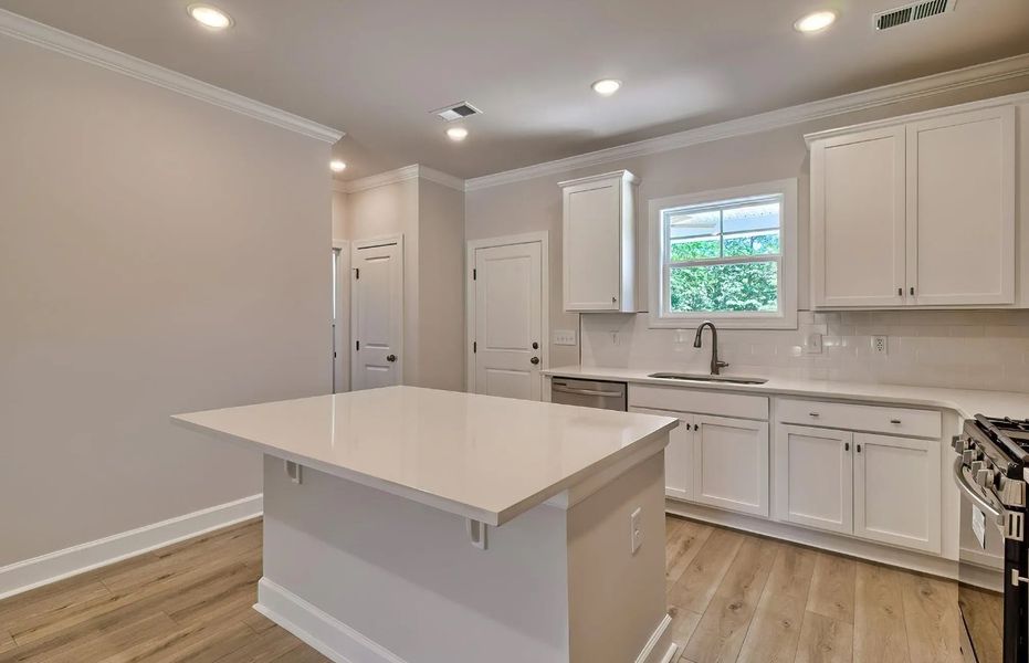 Furnished interior view inside a new home in Satchel Ford, Columbia (Image 6).
