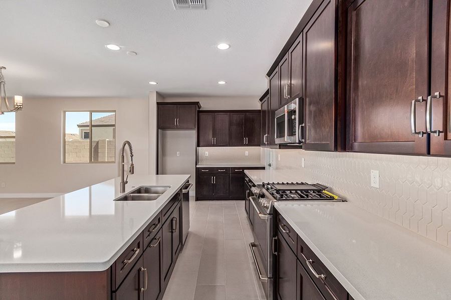 Representative furnished interior of a home built from the Zafiro by Taylor Morrison in CantaMia at Estrella 55+, Goodyear (Image 6).