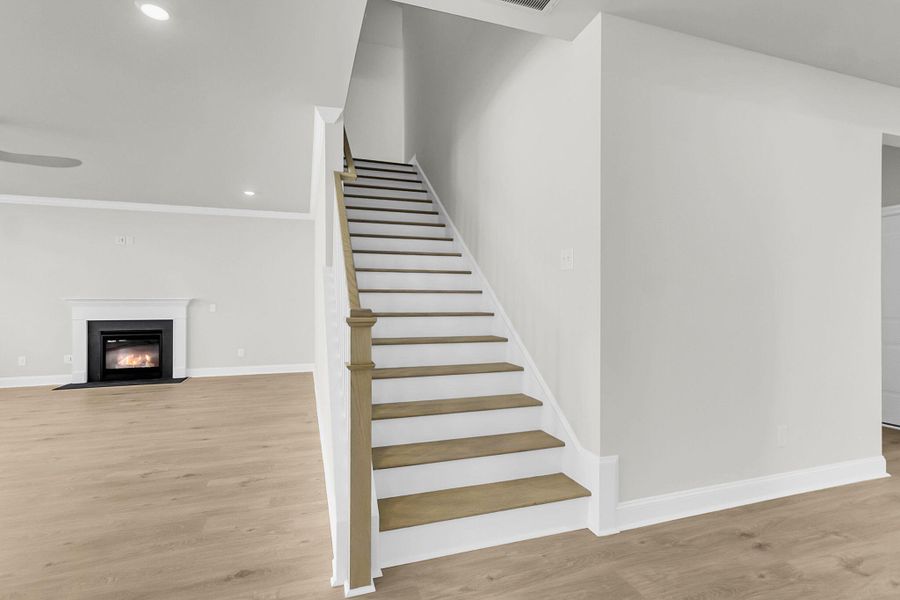 Spacious, unfurnished interior of a new home in Tidewater at Lakes of Cane Bay, Summerville (Image 44).