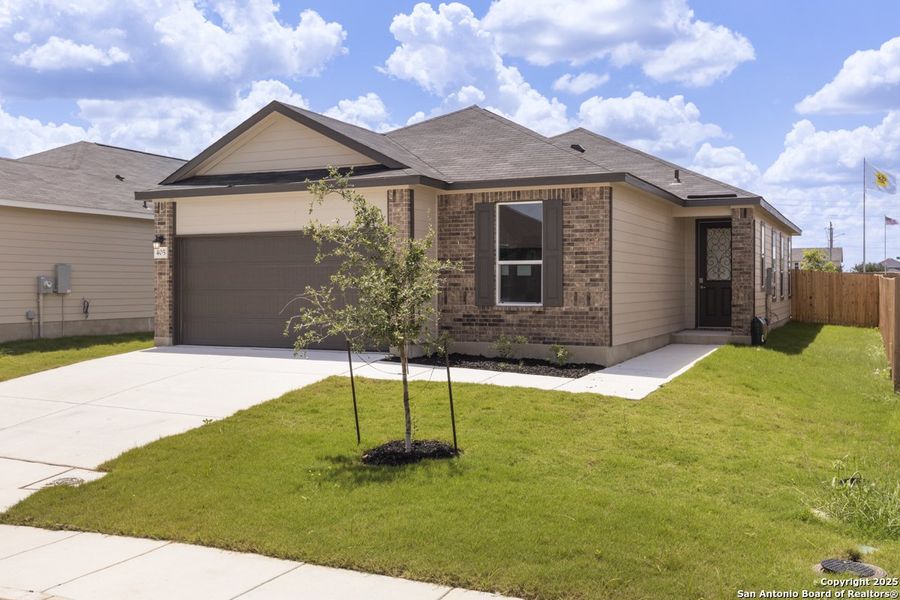 Front exterior of a new home in Woodside Farms, Seguin, TX, highlighting curb appeal (Image 19).