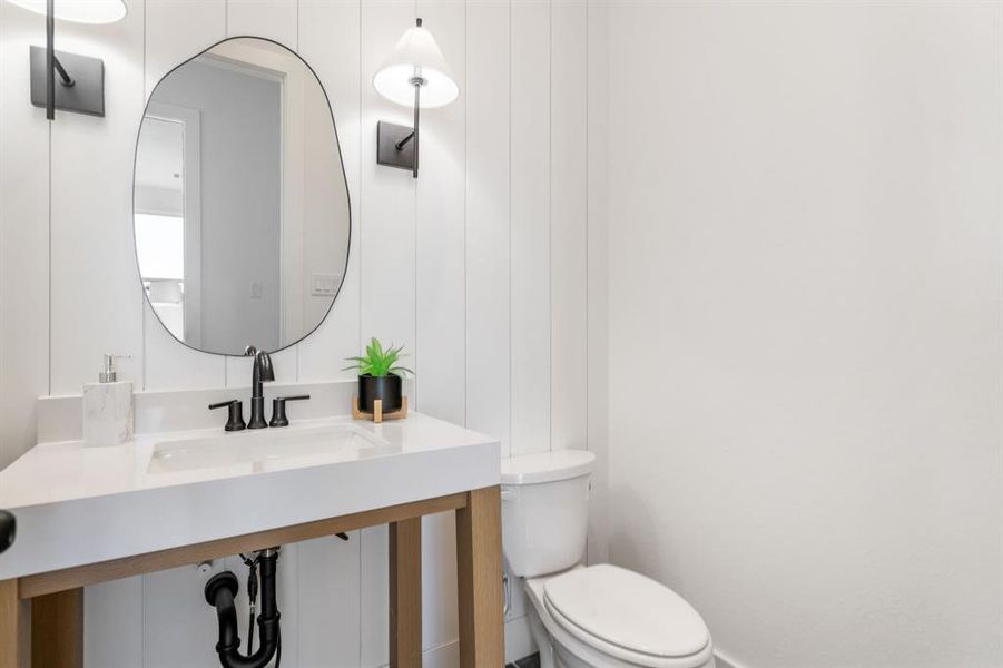 Bathroom with sink and toilet