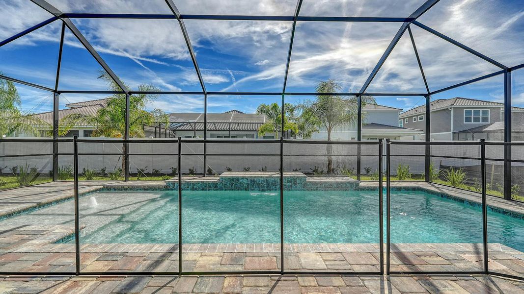 Exterior details and patio area of a home in Windward Real Estate and Homes for Sale in Sarasota, FL - Neal Communities, Lakewood Ranch (Image 27).