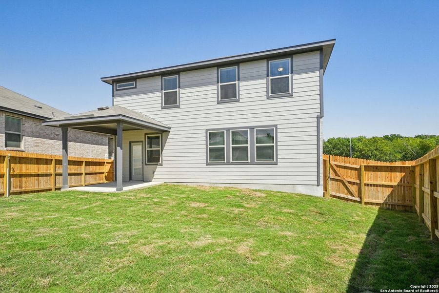 Front exterior of a new home in Comanche Ridge, San Antonio, TX, highlighting curb appeal (Image 1). Front exterior of a new home in Comanche Ridge, San Antonio, TX, highlighting curb appeal (Image 1).