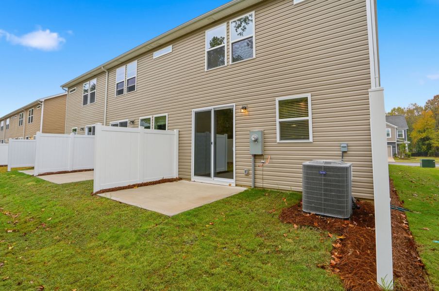 Exterior details and patio area of a home in Hedgecliff Townes, Kannapolis (Image 4). Exterior details and patio area of a home in Hedgecliff Townes, Kannapolis (Image 4).