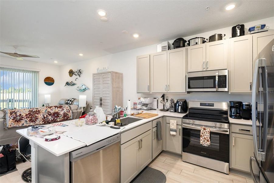 Furnished interior view inside a new home in The Timbers at Everlands: The Villas, Palm Bay (Image 11). Furnished interior view inside a new home in The Timbers at Everlands: The Villas, Palm Bay (Image 11).
