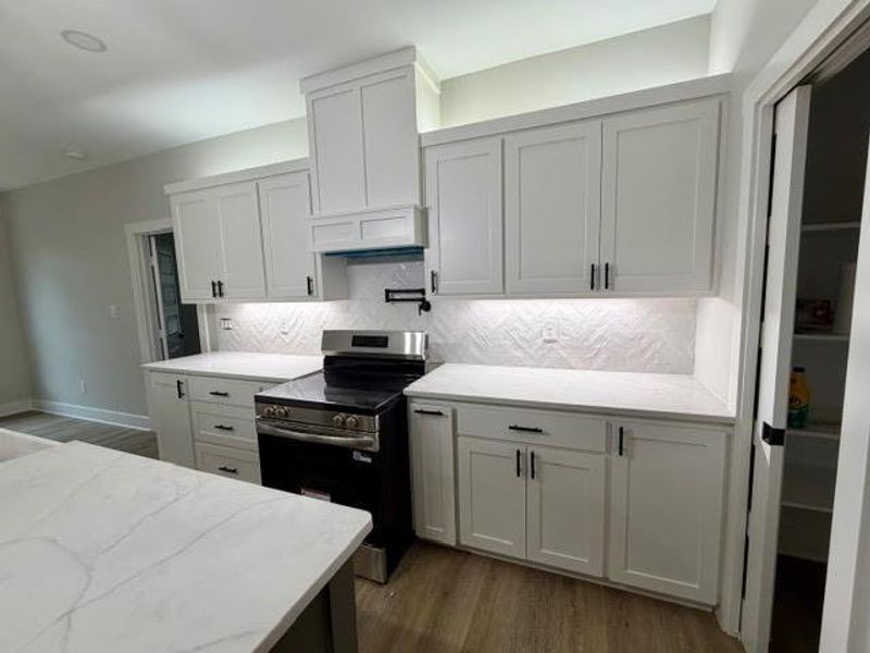 Furnished interior view inside a new home in , Mineola (Image 6).