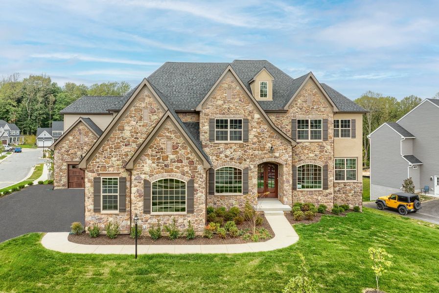 Representative exterior photo of a completed home built from the Devonshire by Keystone Custom Homes in McLean South Shore, Belmont, NC (Image 25).