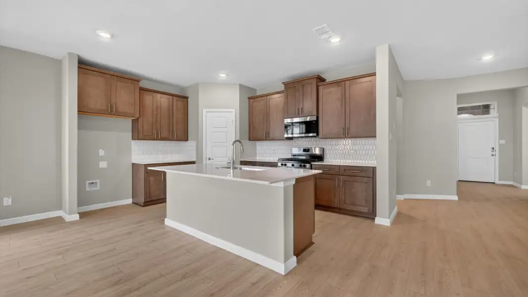 Furnished interior view inside a new home in Bluestem, Rhome (Image 6).