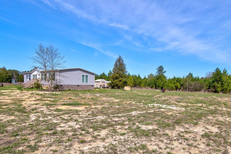 Exterior details and patio area of a home in , Manning (Image 20). Exterior details and patio area of a home in , Manning (Image 20).