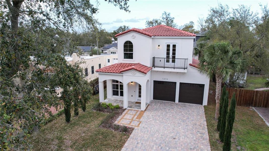 Front exterior of a new home in , Winter Park, FL, highlighting curb appeal (Image 1). Front exterior of a new home in , Winter Park, FL, highlighting curb appeal (Image 1).