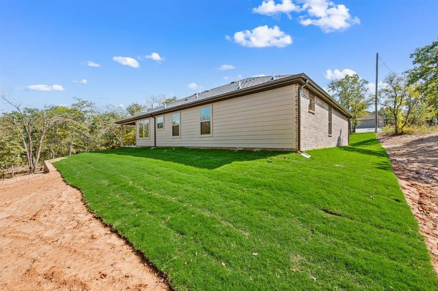 Exterior details and patio area of a home in Runaway Bay, Runaway Bay (Image 2). Exterior details and patio area of a home in Runaway Bay, Runaway Bay (Image 2).