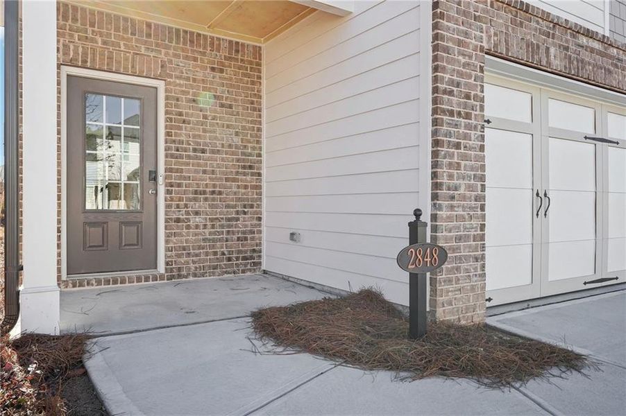 Exterior details and patio area of a home in Hawthorne Station, College Park (Image 3).