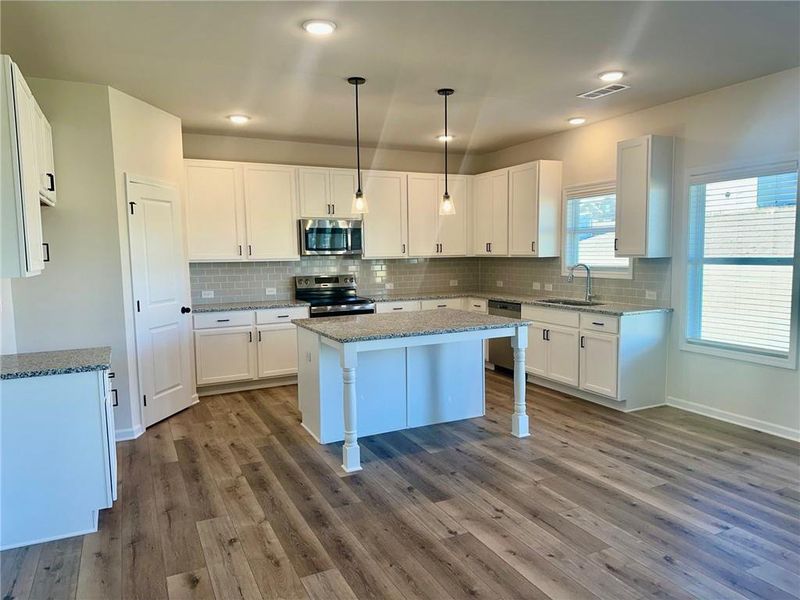 Furnished interior view inside a new home in , Auburn (Image 11).